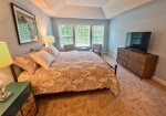 Master Bedroom Suite 1 on Main Floor w private full bath and walk in closet and huge HDTV